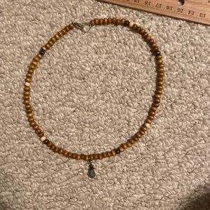 brown necklace with blue charm!